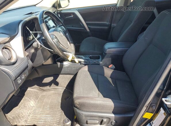 JTMRFREV7JJ243797 2018 TOYOTA RAV4 Синий Вид салона спереди