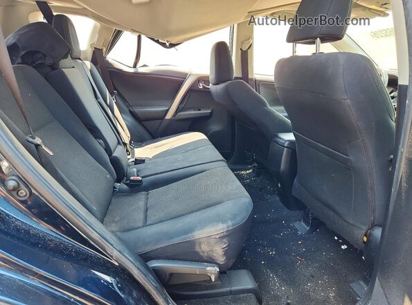 JTMRFREV7JJ745368 2018 TOYOTA RAV4 Teal Rear interior view
