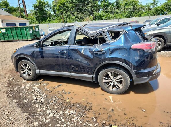 JTMRFREV7JJ745368 2018 TOYOTA RAV4 Teal Rear left
