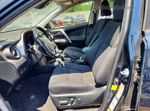 JTMRFREV7JJ745368 2018 TOYOTA RAV4 Teal Front interior view