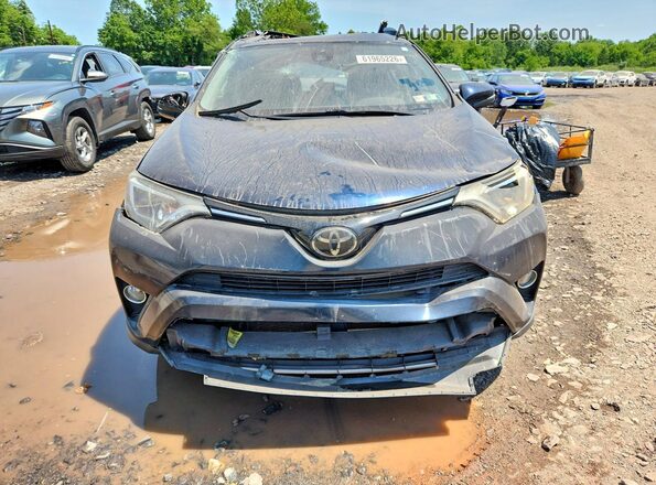 JTMRFREV7JJ745368 2018 TOYOTA RAV4 Teal Front view