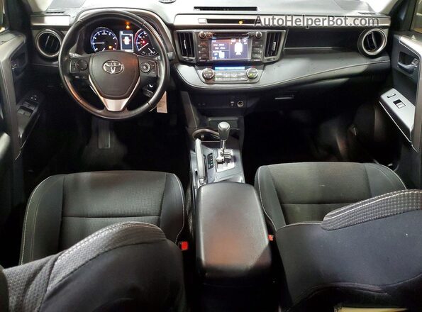 JTMRFREV8GD186677 2016 TOYOTA RAV4 Gray Vista del salpicadero