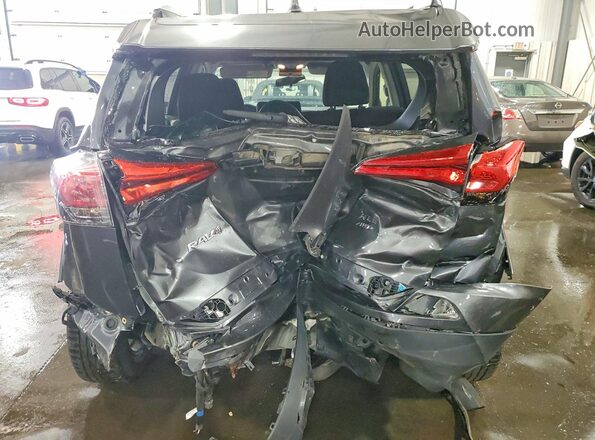 JTMRFREV8GD186677 2016 TOYOTA RAV4 Gray Vista trasera