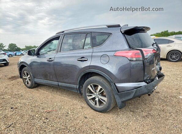 JTMRFREV8JD234802 2018 TOYOTA RAV4 Gray Rear left