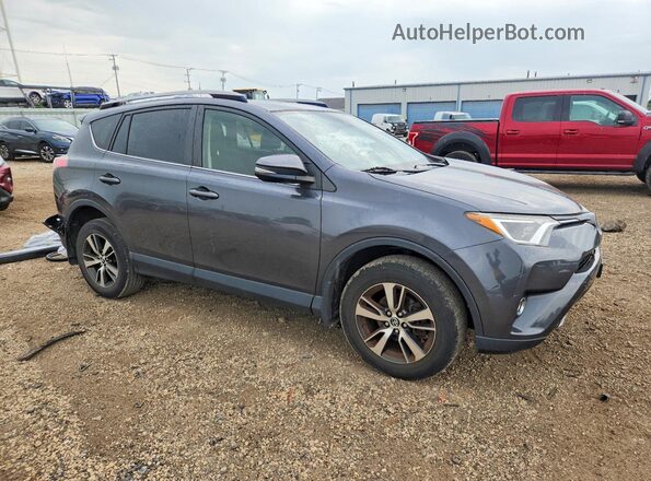JTMRFREV8JD234802 2018 TOYOTA RAV4 Gray Front right