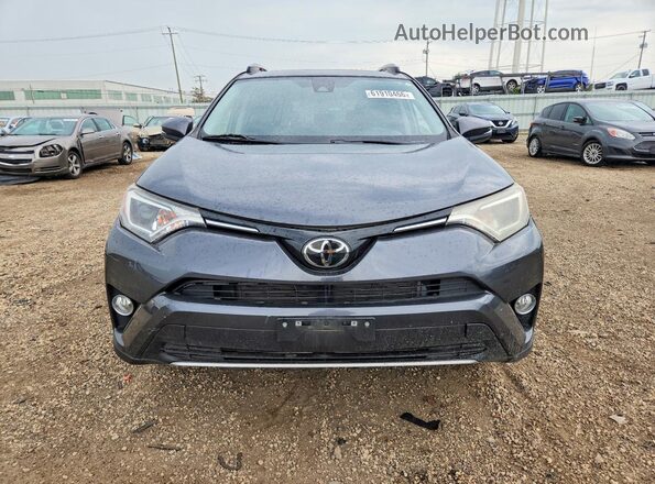 JTMRFREV8JD234802 2018 TOYOTA RAV4 Gray Front view