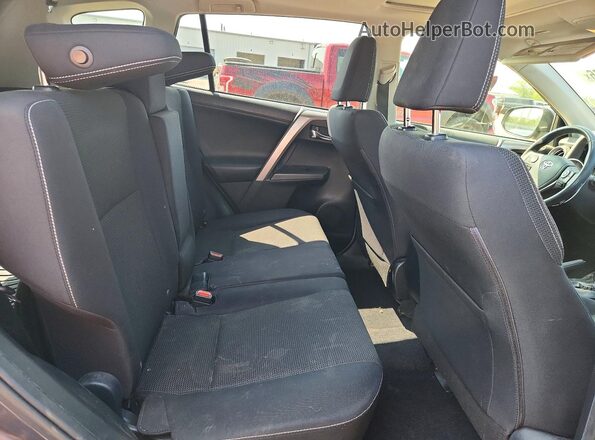 JTMRFREV8JD234802 2018 TOYOTA RAV4 Gray Rear seats view