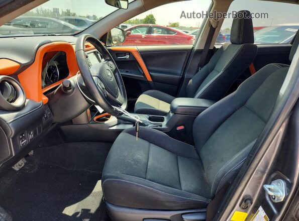 JTMRFREV9GD183920 2016 TOYOTA RAV4 Gray წინა სალონის ხედი