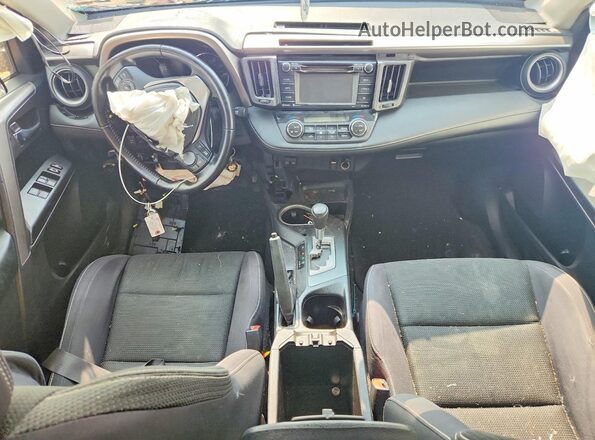JTMRFREV9GJ086136 2016 TOYOTA RAV4 Red Vista del salpicadero