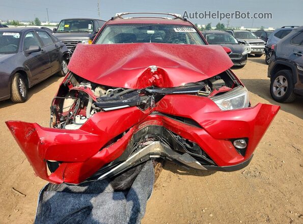 JTMRFREV9GJ086136 2016 TOYOTA RAV4 Red Vista frontal