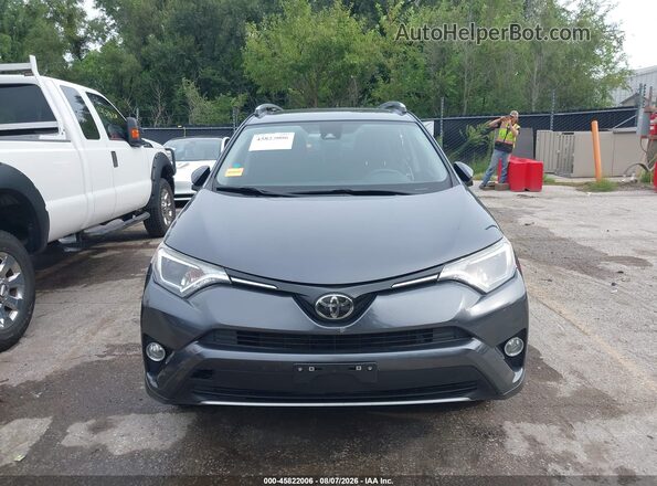 JTMRFREVXHD206736 2017 TOYOTA RAV4 Gray ხელსაწყოთა პანელის ხედი