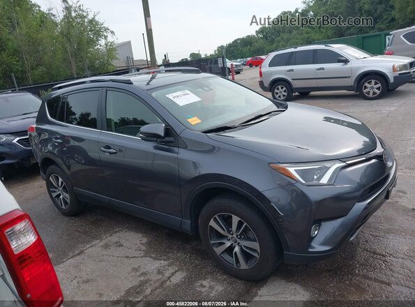 JTMRFREVXHD206736 2017 TOYOTA RAV4 Gray უკანა სალონის ხედი