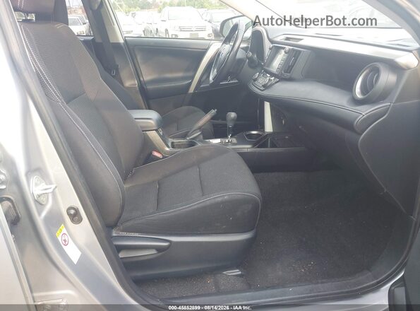 JTMRJREV0JD208645 2018 TOYOTA RAV4 HYBRID Silver Front interior view