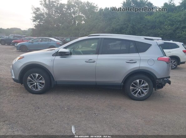 JTMRJREV0JD208645 2018 TOYOTA RAV4 HYBRID Silver 360 interior view