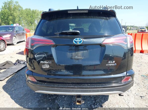 JTMRJREV2JD223003 2018 TOYOTA RAV4 HYBRID Black 