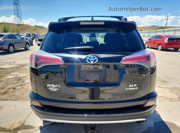 JTMRJREV3HD111336 2017 TOYOTA RAV4 Charcoal Rear view