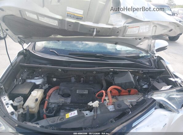 JTMRJREV4GD054983 2016 TOYOTA RAV4 HYBRID Gray Widok z tyłu