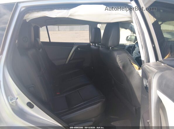 JTMRJREV4GD054983 2016 TOYOTA RAV4 HYBRID Gray Widok naklejki z numerem VIN