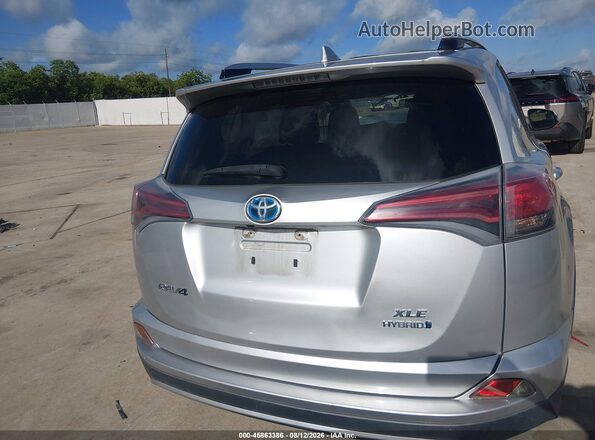 JTMRJREV4GD054983 2016 TOYOTA RAV4 HYBRID Gray 