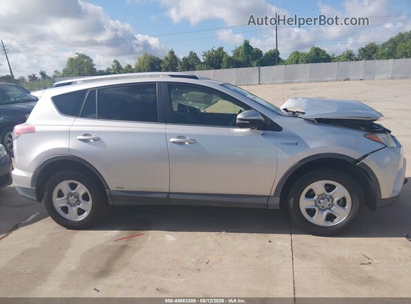 JTMRJREV4GD054983 2016 TOYOTA RAV4 HYBRID Gray Widok wnętrza z tyłu