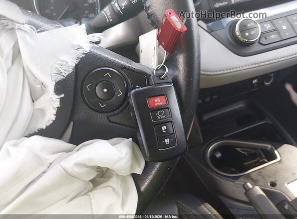 JTMRJREV4GD054983 2016 TOYOTA RAV4 HYBRID Gray Widok deski rozdzielczej