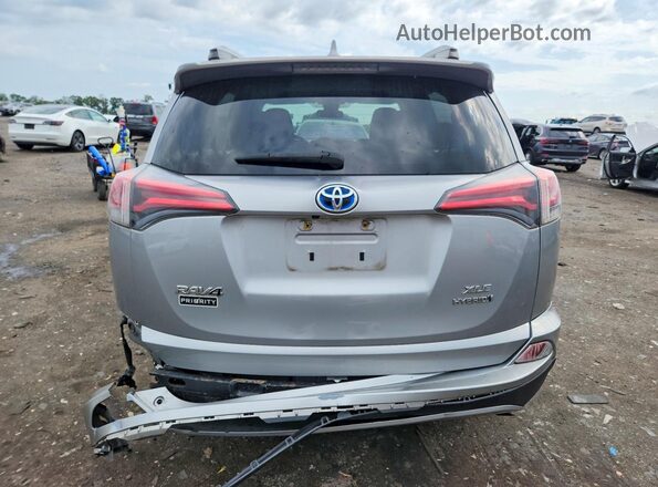 JTMRJREV4HD083787 2017 TOYOTA RAV4 Silver Rear view