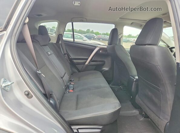JTMRJREV4HD083787 2017 TOYOTA RAV4 Silver Rear interior view