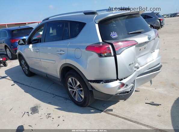 JTMRJREV5GD009020 2016 TOYOTA RAV4 HYBRID Silver Trasero izquierdo
