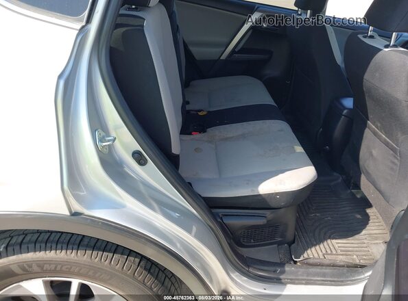 JTMRJREV5GD009020 2016 TOYOTA RAV4 HYBRID Silver Vista de la etiqueta del VIN
