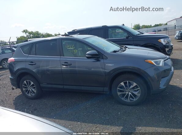 JTMRJREV5HD112102 2017 TOYOTA RAV4 HYBRID Gray Вид задньої частини салону