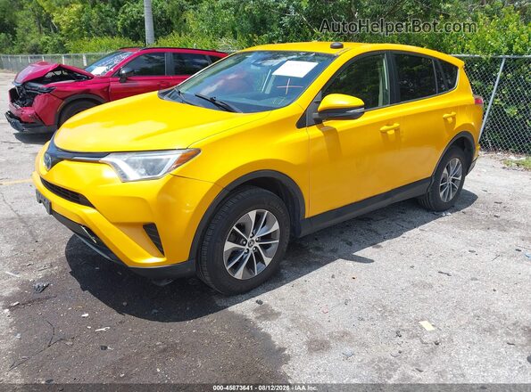 JTMRJREV6JD249362 2018 TOYOTA RAV4 HYBRID Yellow Առջևի ձախ երեք քառորդ տեսարան