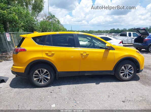 JTMRJREV6JD249362 2018 TOYOTA RAV4 HYBRID Yellow Սալոնի հետևի տեսք