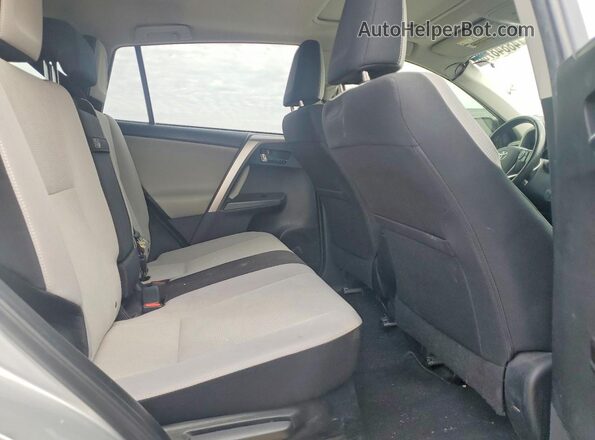 JTMRJREV7GD013151 2016 TOYOTA RAV4 Silver Vista interior trasera