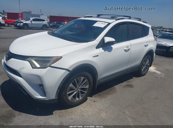 JTMRJREV7GD047008 2016 TOYOTA RAV4 HYBRID White Przód lewy