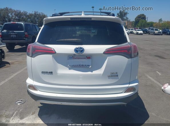 JTMRJREV7GD047008 2016 TOYOTA RAV4 HYBRID White 