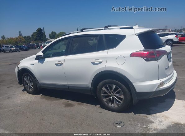 JTMRJREV7GD047008 2016 TOYOTA RAV4 HYBRID White Widok wnętrza z tyłu