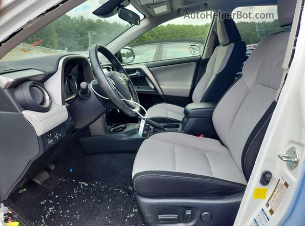 JTMRJREV7JD190256 2018 TOYOTA RAV4 White Vista interior delantera