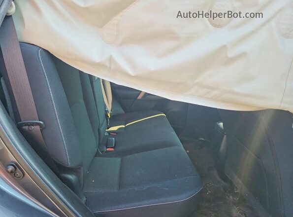 JTMRJREVXGD025715 2016 TOYOTA RAV4 Gray Vista interior trasera