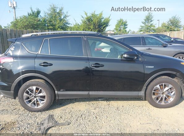 JTMRJREVXJD195645 2018 TOYOTA RAV4 HYBRID Black Widok wnętrza z tyłu