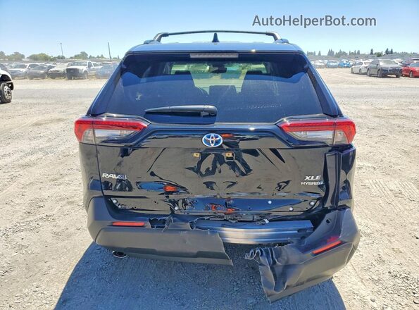 JTMRWRFV0RD253502 2024 TOYOTA RAV4 Black Հետևի տեսք