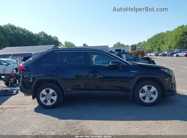 JTMRWRFVXMD558949 2021 TOYOTA RAV4 HYBRID Gray Vista interior trasera