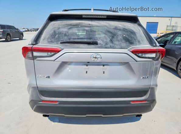 JTMW1RFV5KD024711 2019 TOYOTA RAV4 Silver Vista trasera