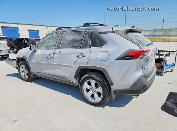 JTMW1RFV5KD024711 2019 TOYOTA RAV4 Silver Trasero izquierdo