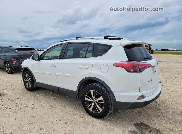 JTMWFREV0HD097318 2017 TOYOTA RAV4 White Rear left