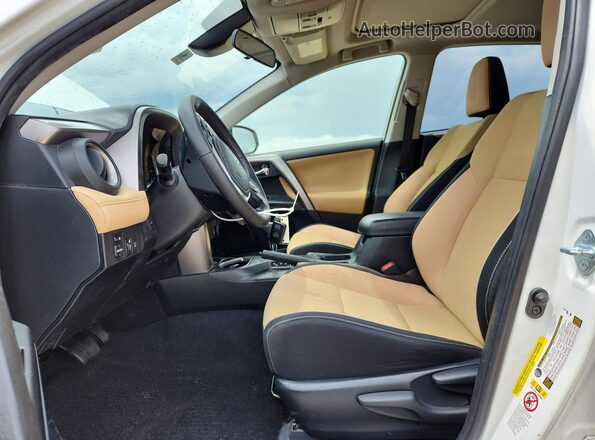 JTMWFREV0HD097318 2017 TOYOTA RAV4 White Front interior view