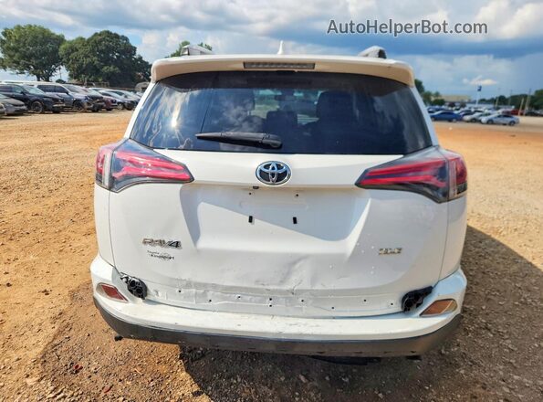 JTMWFREV0HJ130030 2017 TOYOTA RAV4 White Հետևի տեսք