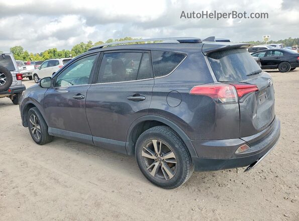 JTMWFREV0HJ700186 2017 TOYOTA RAV4 Gray Rear left