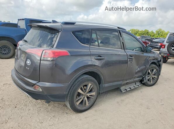 JTMWFREV0HJ700186 2017 TOYOTA RAV4 Gray Rear right