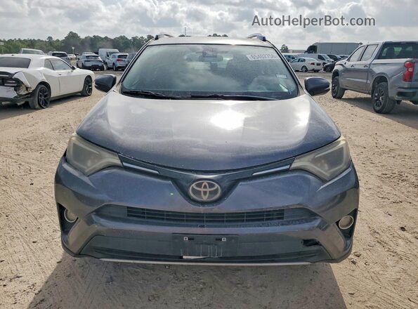 JTMWFREV0HJ700186 2017 TOYOTA RAV4 Gray Front view