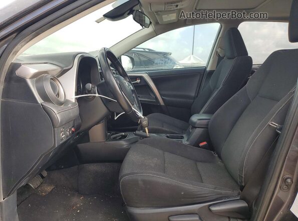 JTMWFREV0HJ700186 2017 TOYOTA RAV4 Gray Front interior view